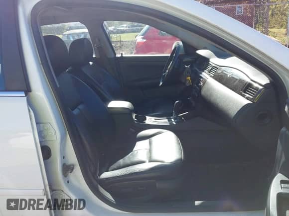 2013 Chevrolet Impala LTZ z VIN 2G1WC5E39D1173228, wystawiony jako IAAI lot #43400363 z przebiegiem 202 040 mil mil oraz . Historia ofert i sprzedaży dostępna na DreamBid. Obrazek 5.