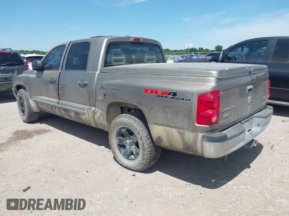 2006 Dodge Dakota with VIN 1D3HW58J86S611250, listed as a IAAI auction lot 42322496 with 251,503 mi miles and . Bid and sale history available at DreamBid. Image 3.