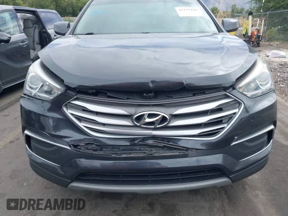 2018 Hyundai Santa Fe 2.4L with VIN 5XYZT3LB7JG562034, listed as a IAAI auction lot 43175229 with 93,961 mi miles and . Bid and sale history available at DreamBid. Image 6.