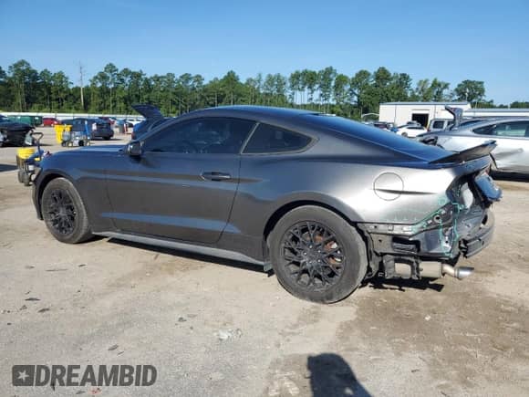 2015 Ford Mustang V6 with VIN 1FA6P8AM8F5304619, listed as a Copart auction lot 68827565 with 101,949 mi miles and Clean title. Bid and sale history available at DreamBid. Image 2.