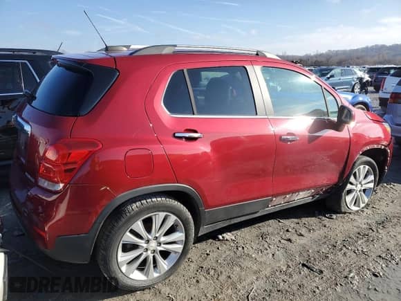 2020 Chevrolet Trax Premier with VIN 3GNCJRSB7LL120275, listed as a Copart auction lot 84662364 with 77,110 mi miles and Salvage title. Bid and sale history available at DreamBid. Image 3.