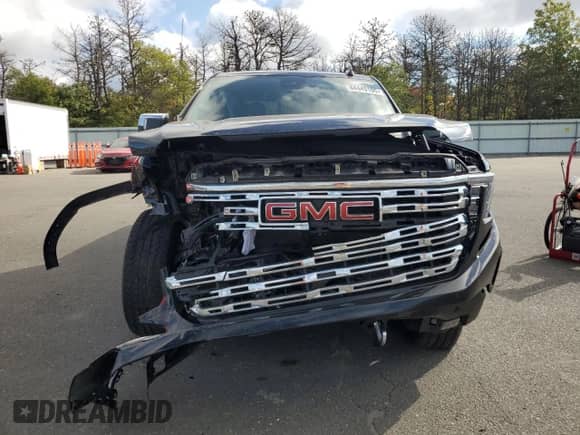 2023 GMC Sierra 1500 Denali z VIN 3GTUUGED2PG233216, wystawiony jako Copart lot #84449105 z przebiegiem 17 876 mil mil oraz Szkoda całkowita • Salvage title. Historia ofert i sprzedaży dostępna na DreamBid. Obrazek 5.