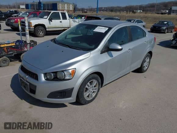 2012 Chevrolet Sonic LT with VIN 1G1JD5SH7C4160567, listed as a IAAI auction lot 41692728 with 174,702 mi miles and . Bid and sale history available at DreamBid. Image 2.