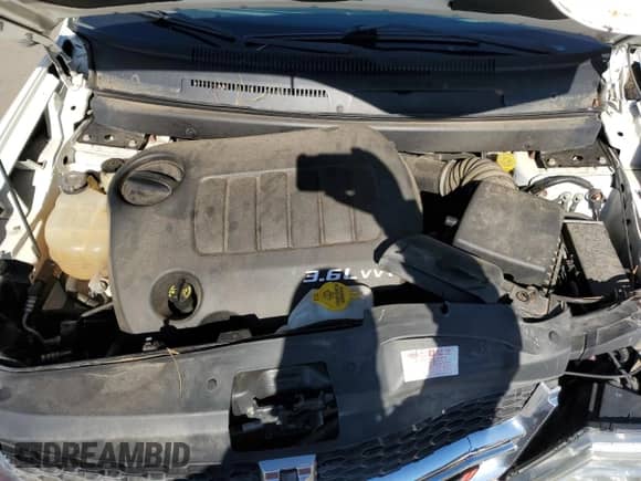 2015 Dodge Journey SXT with VIN 3C4PDDBG3FT613276, listed as a Copart auction lot 85899795 with 151,311 mi miles and Salvage title. Bid and sale history available at DreamBid. Image 12.