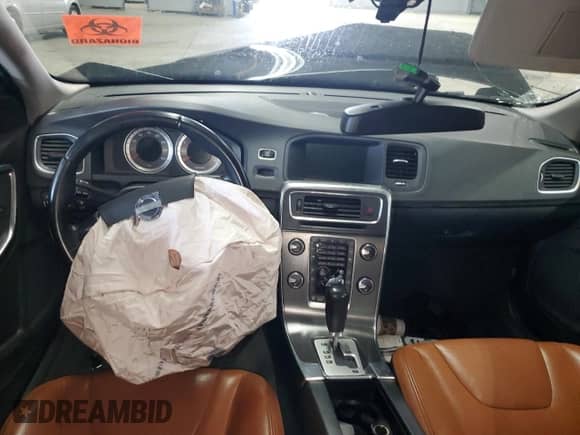 2012 Volvo S60 T5 с VIN YV1622FS3C2117406, выставлен на аукционе Copart как лот 71000155 с пробегом Не указан миль и Списание • Salvage title. История ставок и продаж доступна на DreamBid. Изображение 8.