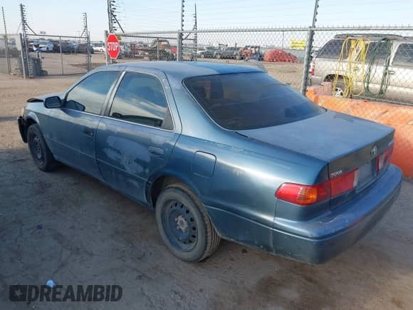 2001 Toyota Camry CE with VIN 4T1BG22K61U856097, listed as a IAAI auction lot 43319135 with Not provided miles and . Bid and sale history available at DreamBid. Image 3.