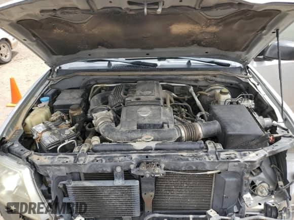 2014 Nissan Frontier S with VIN 1N6AD0EV7EN742755, listed as a Copart auction lot 61940075 with 137,252 mi miles and Salvage title. Bid and sale history available at DreamBid. Image 11.