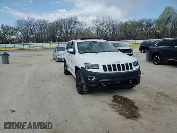 2015 Jeep Grand Cherokee Overland with VIN 1C4RJECG5FC635328, listed as a Copart auction lot 50740185 with 187,041 mi miles and Salvage title. Bid and sale history available at DreamBid. Image 11.
