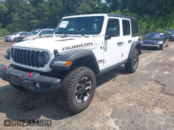 2025 Jeep Wrangler Rubicon with VIN 1C4PJXFN7SW525466, listed as a IAAI auction lot 42950213 with 10,695 mi miles and . Bid and sale history available at DreamBid. Image 2.