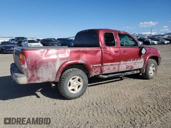 2001 Toyota Tundra Limited z VIN 5TBBT48181S165094, wystawiony jako Copart lot #55515765 z przebiegiem 264 859 mil mil oraz Czysty tytuł • Clean title. Historia ofert i sprzedaży dostępna na DreamBid. Obrazek 3.