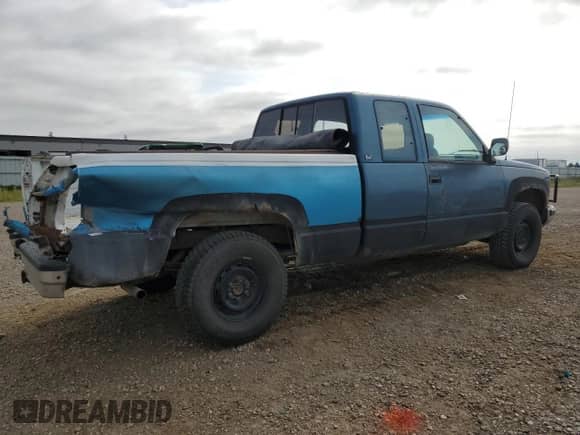 1991 GMC Sierra 1500 SLT z VIN 2GTEK19Z4M1542137, wystawiony jako Copart lot #68024074 z przebiegiem 347 281 mil mil oraz Szkoda całkowita • Salvage title. Historia ofert i sprzedaży dostępna na DreamBid. Obrazek 3.