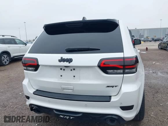 2016 Jeep Grand Cherokee SRT with VIN 1C4RJFDJ0GC456325, listed as a IAAI auction lot 41425211 with 159,746 mi miles and . Bid and sale history available at DreamBid. Image 16.