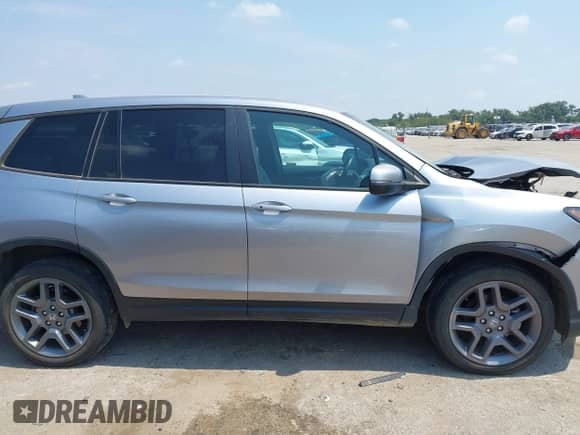 2022 Honda Passport EX-L with VIN 5FNYF8H56NB030824, listed as a IAAI auction lot 43089301 with 16,999 mi miles and . Bid and sale history available at DreamBid. Image 13.