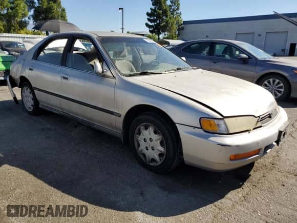 1997 Honda Accord LX with VIN 1HGCD5635VA188629, listed as a Copart auction lot 72042185 with 192,080 mi miles and Salvage title. Bid and sale history available at DreamBid. Image 4.