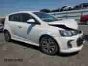 2018 Chevrolet Sonic LT with VIN 1G1JD6SH7J4128656, listed as a Copart auction lot 64282255 with 101,082 mi miles and Salvage title. Bid and sale history available at DreamBid. Image 4.