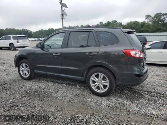 2010 Hyundai Santa Fe Limited with VIN 5NMSK3AB6AH341957, listed as a Copart auction lot 66002155 with 65,331 mi miles and Salvage title. Bid and sale history available at DreamBid. Image 2.