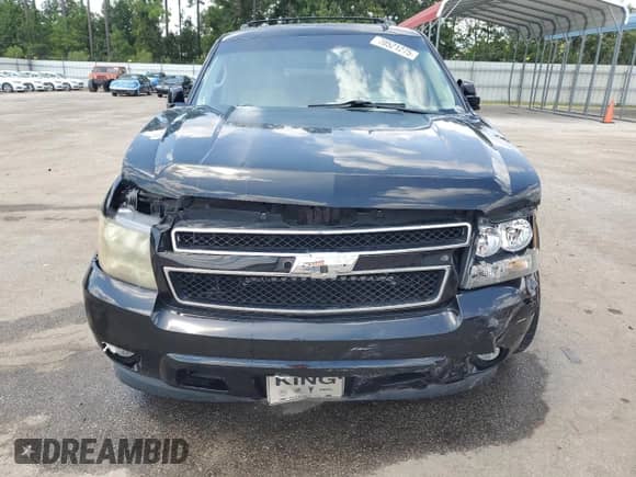 2012 Chevrolet Tahoe LT with VIN 1GNSCBE08CR103498, listed as a Copart auction lot 70521275 with 104,735 mi miles and Salvage title. Bid and sale history available at DreamBid. Image 5.