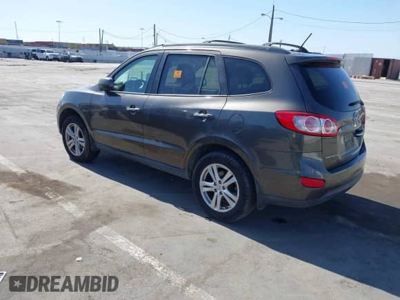 2012 Hyundai Santa Fe Limited with VIN 5XYZK4AG3CG126162, listed as a IAAI auction lot 42526570 with 878,070 mi miles and . Bid and sale history available at DreamBid. Image 3.