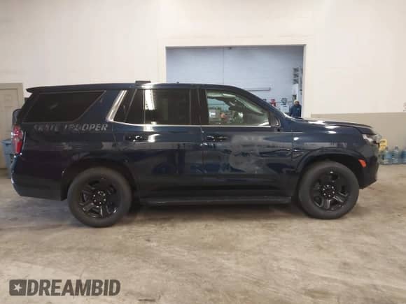 2023 Chevrolet Tahoe Commercial z VIN 1GNSCLED8PR211103, wystawiony jako IAAI lot #41475687 z przebiegiem 16 445 mil mil oraz . Historia ofert i sprzedaży dostępna na DreamBid. Obrazek 13.