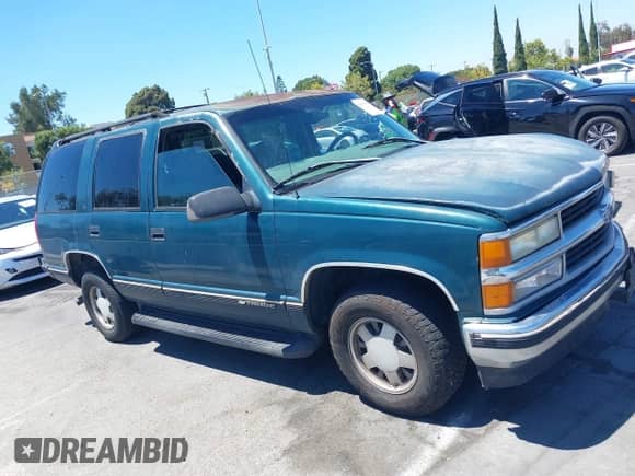1999 Chevrolet Tahoe z VIN 1GNEC13R9XJ503955, wystawiony jako IAAI lot #42830511 z przebiegiem 185 483 mil mil oraz . Historia ofert i sprzedaży dostępna na DreamBid. Obrazek 13.