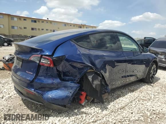 2022 Tesla Model Y Performance with VIN 7SAYGDEF6NF455028, listed as a Copart auction lot 61740254 with 26,869 mi miles and Salvage title. Bid and sale history available at DreamBid. Image 3.