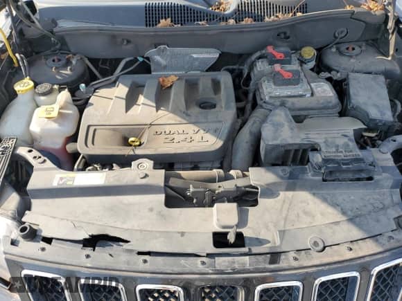 2014 Jeep Compass Sport z VIN 1C4NJDBB9ED544845, wystawiony jako Copart lot #81043775 z przebiegiem 61 554 mil mil oraz Czysty tytuł • Clean title. Historia ofert i sprzedaży dostępna na DreamBid. Obrazek 11.