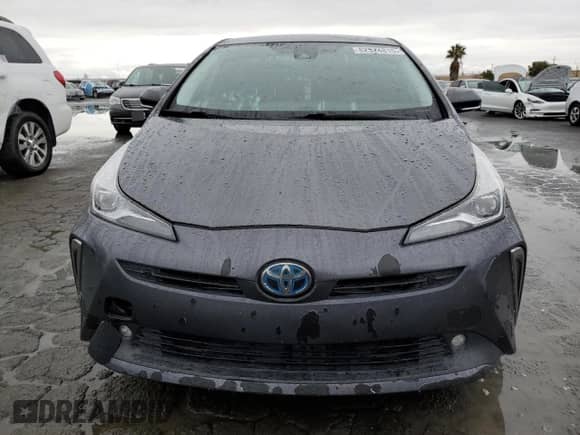 2019 Toyota Prius LE с VIN JTDL9RFU4K3011215, выставлен на аукционе Copart как лот 82524815 с пробегом 130 204 миль миль и Списание • Salvage title. История ставок и продаж доступна на DreamBid. Изображение 5.
