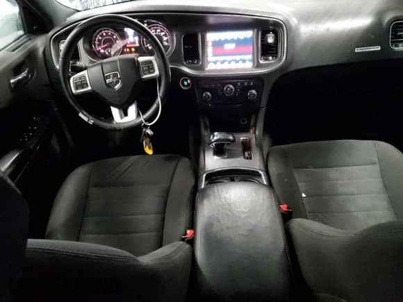 2013 Dodge Charger SXT с VIN 2C3CDXHG7DH705704, выставлен на аукционе Copart как лот 82070115 с пробегом 211 001 миль миль и Списание • Salvage title. История ставок и продаж доступна на DreamBid. Изображение 8.