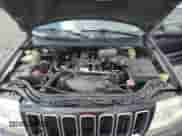 2004 Jeep Grand Cherokee Laredo z VIN 1J4GW48S04C303000, wystawiony jako Copart lot #67077905 z przebiegiem 236 732 mil mil oraz Szkoda całkowita • Salvage title. Historia ofert i sprzedaży dostępna na DreamBid. Obrazek 11.