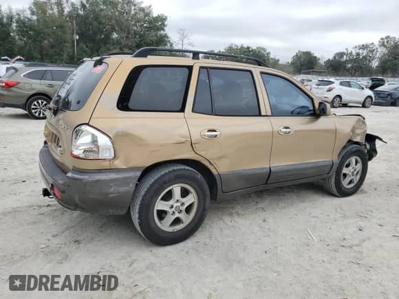 2001 Hyundai Santa Fe GLS с VIN KM8SC83D61U039954, выставлен на аукционе Copart как лот 86175224 с пробегом 378 265 миль миль и Списание • Salvage title. История ставок и продаж доступна на DreamBid. Изображение 3.