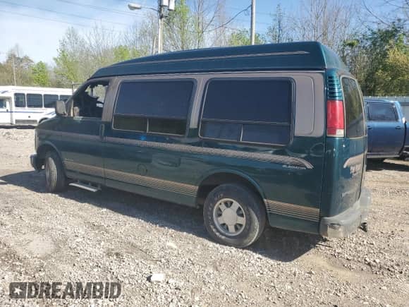1999 Chevrolet Express with VIN 1GBFG15R4X1025575, listed as a Copart auction lot 54046905 with Not provided miles and Salvage title. Bid and sale history available at DreamBid. Image 2.
