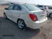 2013 Chevrolet Sonic LTZ with VIN 1G1JE5SB5D4195389, listed as a IAAI auction lot 42400418 with 27,607 mi miles and . Bid and sale history available at DreamBid. Image 3.
