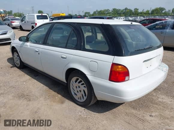 1998 Saturn SW with VIN 1G8ZJ8277WZ175759, listed as a IAAI auction lot 42736060 with 82,281 mi miles and . Bid and sale history available at DreamBid. Image 3.