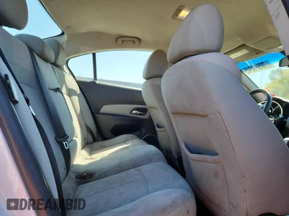 2011 Chevrolet Cruze 1FL z VIN 1G1PE5S90B7235736, wystawiony jako Copart lot #70587245 z przebiegiem 185 810 mil mil oraz Szkoda całkowita • Salvage title. Historia ofert i sprzedaży dostępna na DreamBid. Obrazek 10.