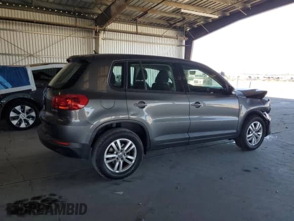 2014 Volkswagen Tiguan S z VIN WVGAV3AX8EW556155, wystawiony jako Copart lot #67572205 z przebiegiem 151 963 mil mil oraz Szkoda całkowita • Salvage title. Historia ofert i sprzedaży dostępna na DreamBid. Obrazek 3.