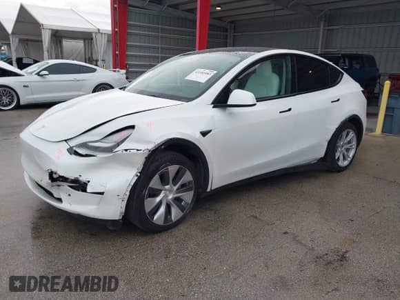2022 Tesla Model Y Long Range z VIN 7SAYGDEE4NF510003, wystawiony jako IAAI lot #43185983 z przebiegiem 25 165 mil mil oraz . Historia ofert i sprzedaży dostępna na DreamBid. Obrazek 17.