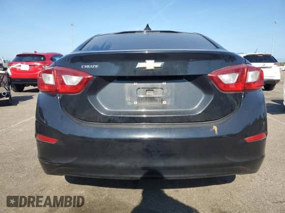 2018 Chevrolet Cruze LS with VIN 1G1BB5SM7J7125403, listed as a Copart auction lot 69429075 with 87,250 mi miles and Salvage title. Bid and sale history available at DreamBid. Image 6.