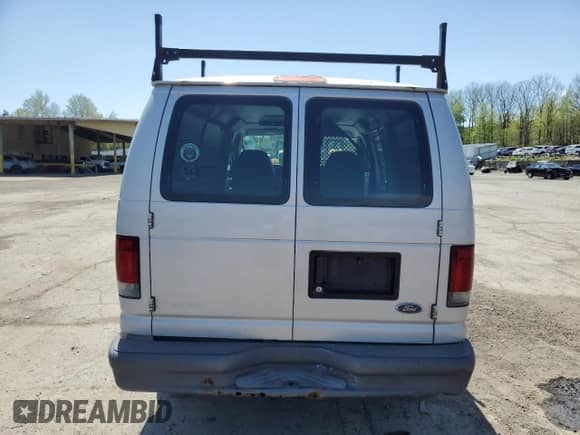 2007 Ford Econoline Cargo Commercial z VIN 1FTNE14W17DB31257, wystawiony jako Copart lot #55140055 z przebiegiem 318 512 mil mil oraz Czysty tytuł • Clean title. Historia ofert i sprzedaży dostępna na DreamBid. Obrazek 6.