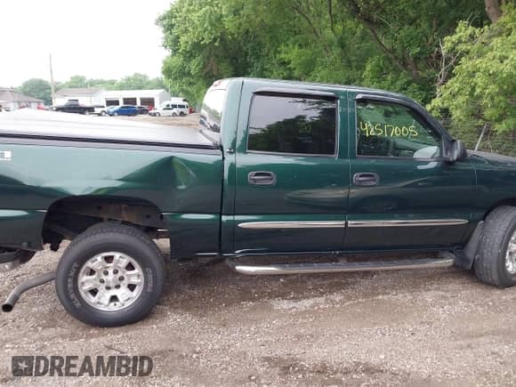 2005 GMC Sierra 1500 SLE with VIN 2GTEK13T751268325, listed as a IAAI auction lot 42517005 with 159,271 mi miles and . Bid and sale history available at DreamBid. Image 13.