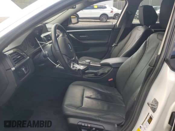 2015 BMW 4 Series 435i xDrive with VIN WBA4B3C58FGV48121, listed as a Copart auction lot 85146585 with 76,930 mi miles and Salvage title. Bid and sale history available at DreamBid. Image 7.