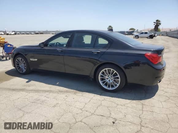 2012 BMW 7 Series 750i xDrive with VIN WBAKC6C53CC395771, listed as a Copart auction lot 58815745 with 106,237 mi miles and Salvage title. Bid and sale history available at DreamBid. Image 2.