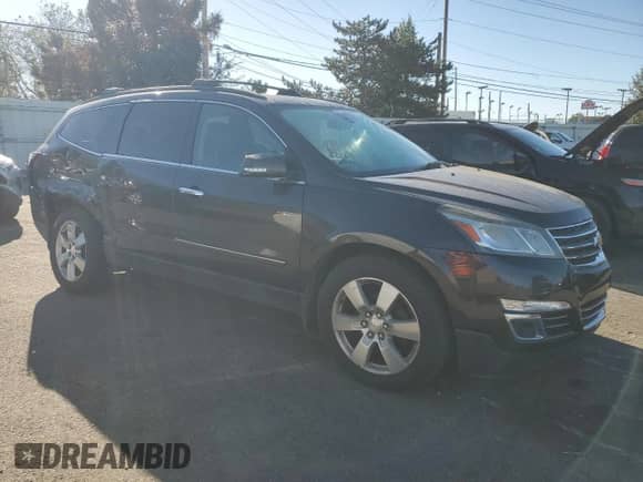 2014 Chevrolet Traverse LTZ with VIN 1GNKVJKD1EJ276597, listed as a Copart auction lot 82419585 with 223,432 mi miles and Salvage title. Bid and sale history available at DreamBid. Image 4.