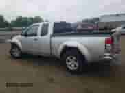 2009 Nissan Frontier SE with VIN 1N6AD06W79C408699, listed as a Copart auction lot 58698925 with 118,451 mi miles and Salvage title. Bid and sale history available at DreamBid. Image 2.