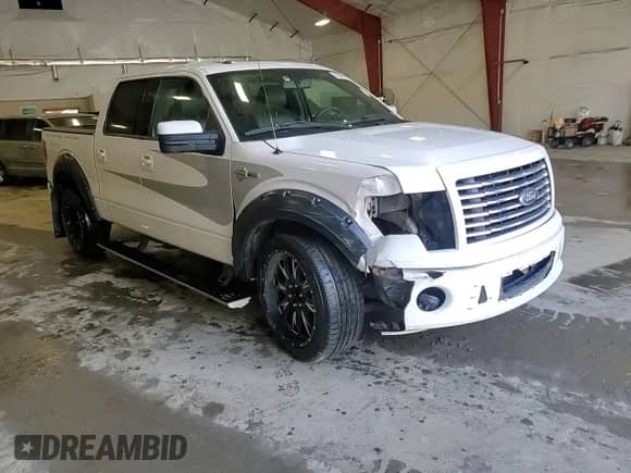 2012 Ford F-150 Lariat z VIN 1FTFW1E64CFB90284, wystawiony jako Copart lot #50325615 z przebiegiem 208 499 mil mil oraz Szkoda całkowita • Salvage title. Historia ofert i sprzedaży dostępna na DreamBid. Obrazek 13.