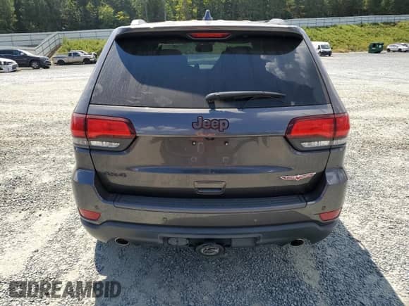 2020 Jeep Grand Cherokee Trailhawk z VIN 1C4RJFLG5LC332048, wystawiony jako Copart lot #81419185 z przebiegiem 54 974 mil mil oraz Szkoda całkowita • Salvage title. Historia ofert i sprzedaży dostępna na DreamBid. Obrazek 6.