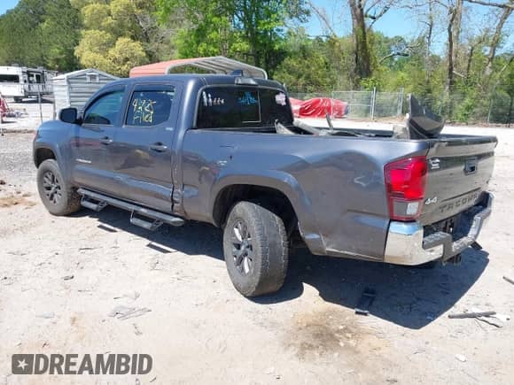 2021 Toyota Tacoma SR5 z VIN 5TFDZ5BN6MX059581, wystawiony jako IAAI lot #42051740 z przebiegiem 65 399 mil mil oraz . Historia ofert i sprzedaży dostępna na DreamBid. Obrazek 3.