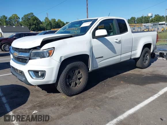 2017 Chevrolet Colorado 2WD WT z VIN 1GCHSBEA4H1169096, wystawiony jako IAAI lot #43139385 z przebiegiem 94 933 mil mil oraz . Historia ofert i sprzedaży dostępna na DreamBid. Obrazek 2.