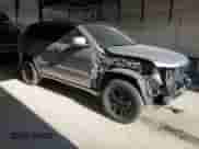 2015 Jeep Grand Cherokee Altitude with VIN 1C4RJFAG6FC777101, listed as a Copart auction lot 84589125 with 102,843 mi miles and Salvage title. Bid and sale history available at DreamBid. Image 4.