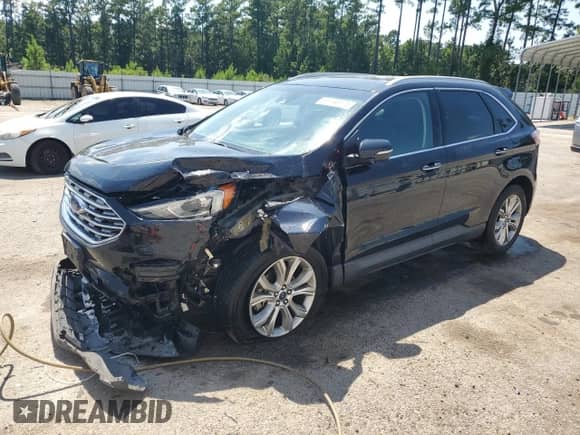 2019 Ford Edge Titanium with VIN 2FMPK3K9XKBB62527, listed as a Copart auction lot 69196175 with 93,207 mi miles and Salvage title. Bid and sale history available at DreamBid. Image 1.