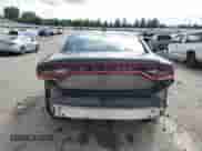 2015 Dodge Charger SE with VIN 2C3CDXFG1FH718048, listed as a Copart auction lot 65519185 with 129,379 mi miles and Salvage title. Bid and sale history available at DreamBid. Image 6.
